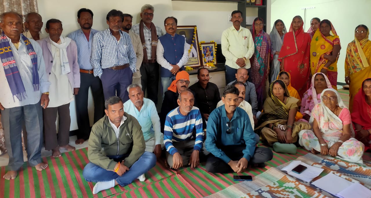 Atul Varade standing with his supporters, celebrating his appointment as Youth Cell President