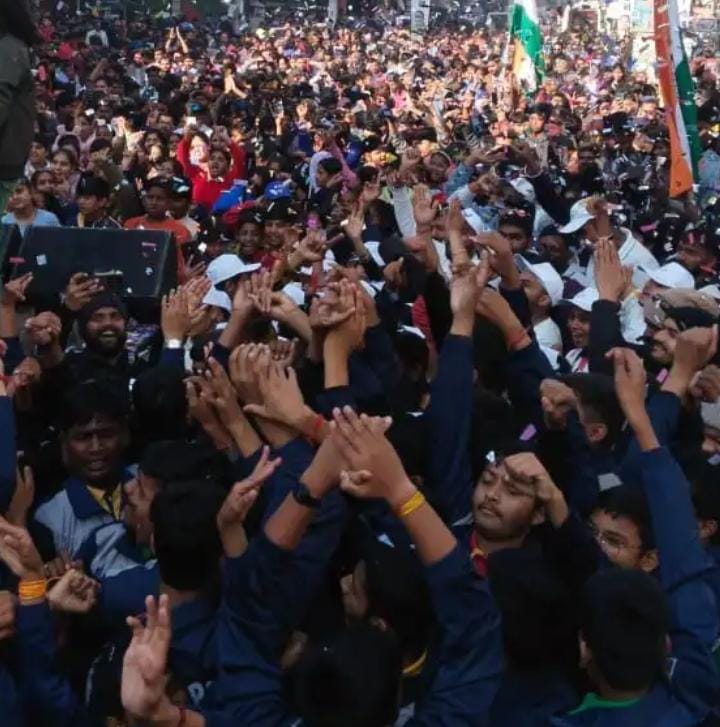 Participants enthusiastically running in the Katni Marathon, showcasing community spirit and health awareness.