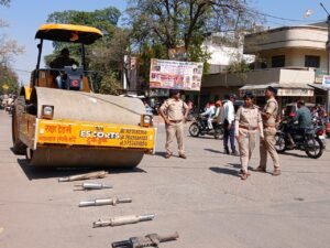Bulldozer crushing illegal loud Bullet silencers seized by Narsinghpur police