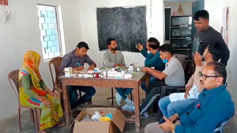 Medical team treating villagers suffering from food poisoning after consuming stale Bhandara food in Datia.