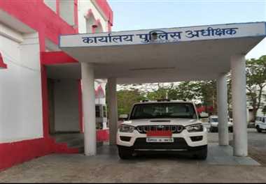 Three arrested constables in MP Police uniform with SP officer inspecting fake Aadhaar documents at Sheopur police station