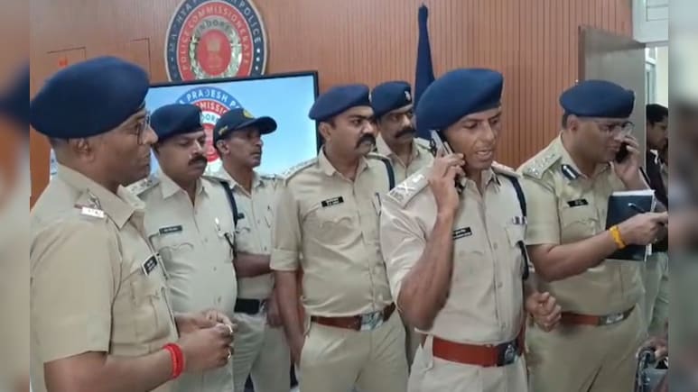 Indore Police Commissioner announcing Section 163 restrictions at press conference