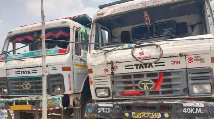 Damaged trucks in Katni after violent attack by former sarpanch Ashish Tiwari
