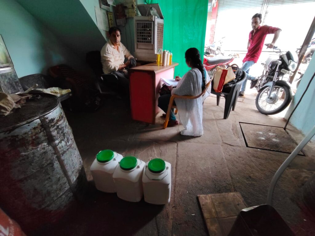 Food safety officers inspecting edible oil products at Muskan Traders store in Vidisha during surprise raid