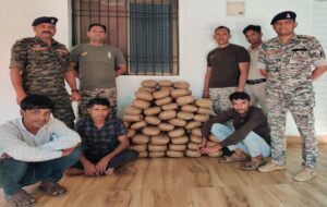 Chhattisgarh police inspecting seized ganja from truck in Kwardha drug bust operation