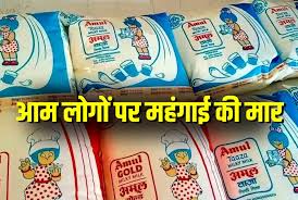Amul milk packets with updated price tags displayed at a Madhya Pradesh grocery store after ₹2 per liter hike