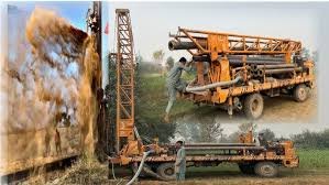 Illegal boring machine operating in Narsinghpur village despite government ban, showing water crisis situation.