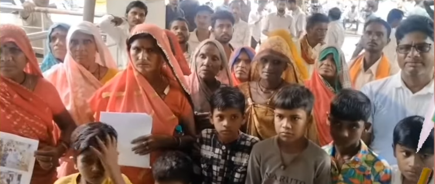 Waterlogged street and blocked drain in Bandhakpur near school zone