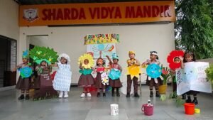 Nursery kids of Sharda Vidya Mandir Bhopal performing environmental awareness program with models and drawings during World Water Week