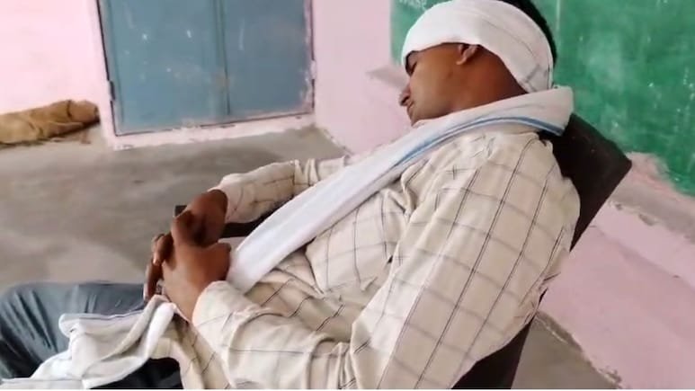 Chhatarpur headmaster caught sleeping during class, students studying in background, education department orders investigation