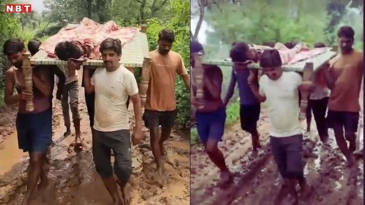 Villagers carrying patient on cot through muddy road in Banshipur, Maihar due to lack of proper road facility