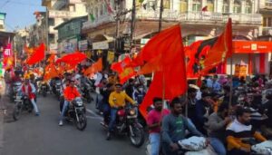 Bajrang Dal rally in Balaghat with Trishul initiation, Shaurya procession, saffron flags, and bike rally chanting slogans Jai Shri Ram and Bharat Mata Ki Jai.