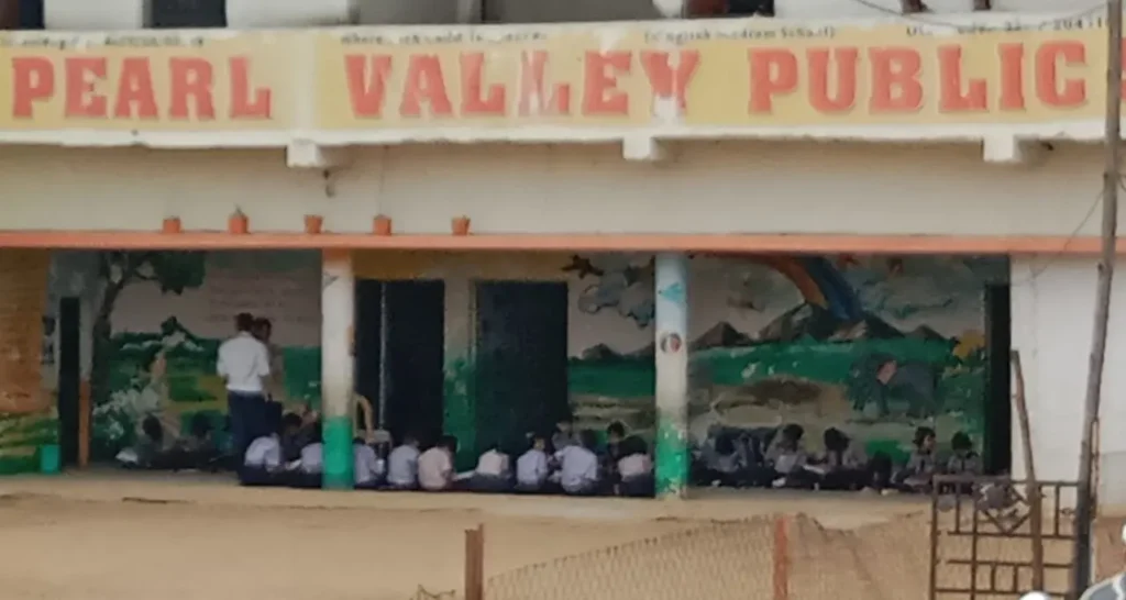 Pearl Valley School in Bargarh accused of arbitrary fees, poor facilities, and negligence by education department – students forced to sit on ground.