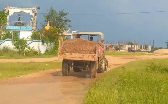 Illegal murum excavation behind Bargahat College hostel construction, exposing corruption and negligence of revenue department.