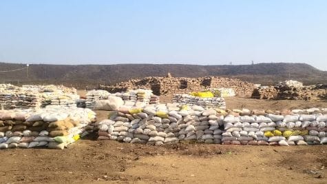 Damaged road at Pipariya Kala paddy procurement center halting trucks and tractors in Katni