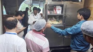 Bhopal Food Safety team inspecting restaurant kitchens and checking expired food items